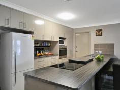  25 Beach Dr Burrum Heads QLD 4659 $349,000 NEAR NEW HOME - STROLL TO THE BEACH THIS IS SIMPLY GREAT VALUE: Two year old, lowset, brick home on a good 810m2 allotment has been reluctantly put on the market to sell. With four bedrooms, all with built-ins and fans plus an open plan, air-conditioned kitchen/dining/lounge area this home lends itself to either a couple or family situation. The spacious main bedroom has a well planned ensuite and walk-in robe with sliding doors out to the patio and back yard. The galley style kitchen is well appointed and has ample cupboard space, full double sink plus pantry. The house itself is still under builders warrantee with a treated pine frame and termite barrier. Economical to maintain and environmentally friendly with both solar panels and solar hot water plus rainwater tank while having the convenience of town water and sewage. On the same theme - there are established veggie gardens and a chook pen plus several fruit trees in this large back yard... so with good side access, the new owners just need to erect a great shed for the caravan or boat. Sirenia Beach is only a few minutes walk away and Burrum Heads is approx. 5km away for shops, doctor, chemist, community centre with library etc plus boat ramps. Enjoy this life-style today at an affordable price. INSPECT TODAY! Other features: Built-In Wardrobes,Garden,Secure Parking,side access Property Details Elders Property ID: 8863657 4 bedrooms 2 bathrooms 2 car parks Double garage Air Conditioning 