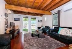  7 Mooralla St Tallai QLD 4213 $599,000 LOCATION, POTENTIAL, VALUE!!! This very useable, mostly level 4000m2 one acre block is in a highly sought after pocket in Tallai. There is a two storey Western Red Cedar timber & brick three bedroom home which is in need of renovation.  Alternatively it is also highly suitable for someone looking for a hard to find, great block of land in a good location who wants to build, is prepared to extend the current dwelling or possibly build a second dwelling (STCA). This property has town water supply. Obviously it also lends itself to being a great opportunity for investors with a rental return estimate in excess of $530 per week and being in an excellent location for potential future development and capital gains. This character home boasts lovely timber floors & timber raked ceilings. It has two separate living areas, a reverse cycle air conditioner downstairs and a generous covered entertaining deck leading out from the kitchen/family area.  This property has a fenced paddock in place to suit a pony or horse. There is ample room for a large shed if desired and it has a great yard for children and animals being fully fenced on three sides.  It's position is situated close to Mudgeeraba Village and is within easy walking distance to the Mudgeeraba State School, Tallai Child Care Centre, Tallai General Store and the sporting grounds. The M1 is a mere 1.5kms for commuters and Robina Hospital, Rail & Town Centre only 2kms as the crow flies! This is the first time that this property has been on the market in 20 years!!! Evidence reveals that with only 3 sales made in this street in the past 7 years it is a tightly held location. Being realistically priced and offering loads of potential and possibilities, it will without doubt sell quickly. So do not hesitate or you will miss out!! Other features: Built-In Wardrobes,Close to Schools,Close to Shops,Close to Transport,Garden Property Details Elders Property ID: 9368302 3 bedrooms 1 bathrooms 2 car parks Land Area 4000 square metres Double garage Air Conditioning 