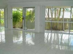  6 Portland Court Parkwood QLD 4214 $575,000 PARKWOOD - BIG FAMILY NEEDED! Situated in a quiet cul-de-sac and only 200m to the Arundel Shopping Centre with the convenience of Coles, Newsagent, Doctor, Vet and the Tavern. Parks, walking tracks and Golf Courses are only minutes away. The Gold Coast Hospital and Griffith University as well as the next stage of the Rapid Transit or G-Link as it is known, is only a short drive away making this home ideal for an owner occupier or a savvy investor. The home itself is a lowset modern contemporary design constructed of rendered brick and tile and is packed full of features such as 6 bedrooms, 3 bathrooms, double garaging and heaps of room for off street parking. The living areas are generous with a separate lounge & an open kitchen overlooks the dining & family rooms. The island benchtop is highly functional and features walk in pantry, electric cooktop, single opening fridge space, dishwasher and low maintenance laminate benchtop. The master bedroom is a good size and is located at the rear of the home. It features a walk through robe and ensuite. Other Bedrooms have ceiling fans throughout, fly screens and built in robes. There are security doors on the front and back doors to help a breeze throughout while fly screens are on all windows including vertical blinds throughout. There is a large double door linen cupboard adjacent to the laundry. Summary of features; * 6 Bedrooms * Master bedroom with walk through robe and ensuite * Other bedrooms have ceiling fans, built in robes and blinds * Large Kitchen with Island bench, laminate benchtop * 2 separated living areas * Combination of tile and carpet throughout * Internal access from Garage * Security screens on front and rear doors * Low maintenance gardens and lot * Entertaining area at the rear * Walk to Arundel Plaza, Arundel Tavern, local Gym, Vet, Doctor, Vet * Great access to the M1 motorway * Currently tenanted at $620 per week This location is popular with students, hospital workers and ideally located for travel to Brisbane and South Gold Coast with its easy access to the M1 motorway. With the new light rail coming in the coming years, this location is going to be even more in demand. For more information and inspection times, please call Stephen McCann   Property Snapshot  Property Type: House Construction: Rendered Block Features: Built-In-Robes Close to schools Close to Transport Dishwasher Ensuite Family Room Internal Access via Garage Lounge Storage 