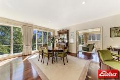  91 Empire Circuit Deakin ACT 2600 BLUE RIBBON LIFESTYLE OPPORTUNITY! Presenting a rare opportunity to secure a prestigious home in one of Deakin’s finest streets.  Architecturally designed with light and space in mind, this home captures the grace and grandeur of this dress circle location. Generously proportioned spaces, an abundance of light and superior craftsmanship create a luxurious home of classic style and sophistication.  This property includes the natural warmth and beauty of polished Jarrah floorboards and is complimented by elegant décor and quality finishes. This inviting home offers sun drenched lounge, dining and family areas, high ceilings, formal entrance with ornate chandelier, stylish bathrooms, segregated bedrooms and ample space for entertaining.  The serene, picturesque garden has been designed to bring its ambience into the home through the large full length windows in the living areas. The new owners will appreciate the lovingly cared for mature landscaped grounds. The beautifully manicured garden rooms and circular drive add to the grand quality of this large 1455m2 estate.  Features: • 	 Classic light-filled layout with a comfortable natural warmth • 	 Several spacious living areas include large formal lounge, informal lounge, dining and family room • 	 Updated kitchen with granite benches, Smeg appliances and insinkerator • 	 Large formal entrance with ornate chandelier • 	 Polished Jarrah flooring throughout living areas with high ceilings  • 	 Spacious bedrooms, all with built-in-robes • 	 Powder room – providing access from garden and inside access for guests • 	 New ducted gas heating • 	 Ample storage space throughout –with under stair storage ideal for cellar  • 	 Back to base alarm • 	 Mature landscaped gardens with excellent structure and sprinkler system throughout the garden • 	 Circular drive with porte-cochère • 	 Single auto garage with internal access Offering excellent convenience, this prestigious residence is located only steps away from Canberra Girls Grammar School, and just minutes to Deakin Shops, Calvary John James Hospital, Parliamentary Triangle, Manuka, Kingston, Lake Burley Griffin and the City. Property Details Elders Property ID: 8955201 4 bedrooms 2 bathrooms 2 car parks Land Area 1455 square metres Single garage Single carport Energy Rating: 2 