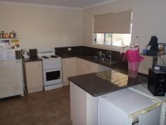  12 Luff St Roma QLD 4455 $220,000 A GOOD FIRST BUYERS HOME Near new home with 3 bedrooms all with built ins and carpet. Evaporator air conditioning throughout. Open plan kitchen with dining. Lounge set at the front of the House. Kitchen has electric stove, pantry, ample cupboard space. Bathroom has vanity, shower, separate bath and linen cupboard. Gas, hot water system, rainwater tank, double carport and fully fenced yard.   Property Snapshot  Property Type: House Features: Built-In-Robes Fully Fenced Yard Gas Lounge Rain Water Tank 