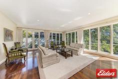  91 Empire Circuit Deakin ACT 2600 BLUE RIBBON LIFESTYLE OPPORTUNITY! Presenting a rare opportunity to secure a prestigious home in one of Deakin’s finest streets.  Architecturally designed with light and space in mind, this home captures the grace and grandeur of this dress circle location. Generously proportioned spaces, an abundance of light and superior craftsmanship create a luxurious home of classic style and sophistication.  This property includes the natural warmth and beauty of polished Jarrah floorboards and is complimented by elegant décor and quality finishes. This inviting home offers sun drenched lounge, dining and family areas, high ceilings, formal entrance with ornate chandelier, stylish bathrooms, segregated bedrooms and ample space for entertaining.  The serene, picturesque garden has been designed to bring its ambience into the home through the large full length windows in the living areas. The new owners will appreciate the lovingly cared for mature landscaped grounds. The beautifully manicured garden rooms and circular drive add to the grand quality of this large 1455m2 estate.  Features: • 	 Classic light-filled layout with a comfortable natural warmth • 	 Several spacious living areas include large formal lounge, informal lounge, dining and family room • 	 Updated kitchen with granite benches, Smeg appliances and insinkerator • 	 Large formal entrance with ornate chandelier • 	 Polished Jarrah flooring throughout living areas with high ceilings  • 	 Spacious bedrooms, all with built-in-robes • 	 Powder room – providing access from garden and inside access for guests • 	 New ducted gas heating • 	 Ample storage space throughout –with under stair storage ideal for cellar  • 	 Back to base alarm • 	 Mature landscaped gardens with excellent structure and sprinkler system throughout the garden • 	 Circular drive with porte-cochère • 	 Single auto garage with internal access Offering excellent convenience, this prestigious residence is located only steps away from Canberra Girls Grammar School, and just minutes to Deakin Shops, Calvary John James Hospital, Parliamentary Triangle, Manuka, Kingston, Lake Burley Griffin and the City. Property Details Elders Property ID: 8955201 4 bedrooms 2 bathrooms 2 car parks Land Area 1455 square metres Single garage Single carport Energy Rating: 2 
