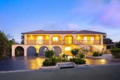  5 Lambell Cl Palmerston ACT 2913 Grand-Scale Family Sophistication For All Occasions Without a doubt, this is one of the most stunning residences’ that has ever been available for sale in Palmerston! The property is in a peaceful cul-de-sac position and with impressive street appeal which will captivate immediately, while the home's outstanding array of living spaces across two expansive levels promise relaxed entertaining and family harmony. Beautifully maintained and original, the residence presents as new, with all the inclusions and elegant finishes expected in a home of this style. Over the two levels the home has everything that a family could ask for; The quality construction is evident throughout, with the functional floor plan offering five independent and generous living areas, suitable for many family combinations wanting a private and tranquil oasis. Don’t miss out on this opportunity to secure one of the best homes in Palmerston.  Features: Living (excluding garage) = 385sqm + 29sqm of Store 5 Living Areas 6 Bedrooms 3 Car Accommodation  Ducted R/C Heating & Cooling Double Brick Miele Dishwasher  Electrolux Oven & Gas Cooktop Huge wrap around entertaining terrace with views  Storeroom or Workshop Separate family / meals room off the kitchen Loads of Storage Triple garage with internal and remote access NBN Connected Ample driveway parking for several vehicles UV: $341,000.00 Rates: $2,106.00 approx Land Tax: $3,187.00 approx   Property Snapshot  Property Type: House House Size: 385.00 m2 Land Area: 814 m2 Features: Ensuite EER: 2.5 