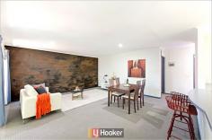  10/10 Tank Street Phillip ACT 2606 $330,000 Central Woden location within walking distance to Canberra Hospital This modernised two bedroom apartment benefits from the North Easterly aspect with leafy views offering the perfect orientation for light, airy and private living. The open plan lounge and dining room area is overlooked by a very generously sized kitchen with new oven, cook top and dishwasher. With plenty of bench space, extra shelving and a breakfast bar, this kitchen resembles those found in houses rather than an apartment. Both the bedrooms have built-in wardrobes and are separated by a large bathroom with spa bath and European style laundry. Features: - Central Woden location close to the hospital - Approx 89m2 first floor apartment in small complex - Reverse cycle air-conditioning and EER 6 stars - Balcony with views of mature leafy trees and parkland - Modern decor including lined curtains and LED down lights - Carport plus visitor parking and intercom system Figures: - Body Corporate fees $3819 per annum including sinking fund - Body Corporate manager - ACT Strata Management Services - Units Plan 995 - Rates TBA - Land Tax (payable for investment properties only) TBA - EER 6 - 88.9m2 living + 8m2 balcony - Built 1993 A very well updated and maintained apartment that is vacant and ready to move in to. Alternatively it would make an ideal investment property with demand from prospective tenants strong in this area.   Property Snapshot  Property Type: Apartment Aspect Views: North East Construction: Brick Veneer Zoning: Unit No: 10 House Size: 88.90 m2 Features: EER 6.0 EER: 6.0 