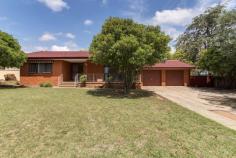  14 Hayward St Macgregor ACT 2615 Room For all the Family If you’re looking for extra living space, a lovely leafy street, a great sized backyard and a value packed home for the whole family… look no further. Set in a fantastic street with easy access to buses, parkland, schools and shops, this impressive family home offers spacious formal and informal living areas, modern kitchen with near new appliances and three good sized bedrooms with built in wardrobes.  Outdoors there is a great sized covered entertaining deck and a huge backyard for the kids. And there is ample off street parking, a double garage and an extra workshop/ studio. Some of the many features include:  • 	 Three good sized bedrooms with built in wardrobes • 	 Spacious floor plan of approximately 128sqm • 	 Modern cupboard filled kitchen • 	 Formal and informal living areas including a large family room • 	 Large covered entertaining deck • 	 Double garage and extra shed/ studio out the back • 	 A huge leafy backyard, with plenty of space for children and pets to play • 	 Fantastic position within easy reach of buses, parkland schools and local shopping This value packed home won’t last long - don’t miss it.   Property Snapshot  Property Type: House Land Area: 959 m2 Features: EER: .0 