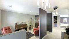  101 Miller St O'Connor ACT 2602 Passion, Drive and Energy.. Auction 16/03/2016 - In room auctions LJ Hooker Canberra City level 1, 182-200 City Walk Canberra City at 6.00pm. It has taken all of the above to create something as attractive as this wonderful O’Connor home. The current owners have loved being so close to the City and the local attractions such as the Lyneham shops, the ANU and the Golf Course. The approaching retirement with a move to the country has prompted the sale at this time. The home is 6 years young, features four generous bedrooms, ensuite bathroom, two infinity gas hot water systems so you need never to run out of hot water. We think you will like the study or music room and its glass wall plus take a close look at the dedicated split level home theatre that has to be experienced to be fully appreciated. The theatre comes with a 130 inch screen and cinema quality JVC projector. You can discuss the existing seating and speakers as an optional extra. There are many hidden extras within the home including soft closing draws, Baumatic appliances including the fully integrated dishwasher, microwave and gas cooker. The front windows have been double glazed, ducted gas heating is installed as well as ducted evaporative cooling and a great looking real flame gas heater stands in a central location dividing the living areas. In slab heating is installed in the ensuite so mornings will be comfortable for you. The family room faces north for added comfort and also opens to a covered alfresco dining area with two external gas outlets. Standing front and center is a marvelous Japanese maple tree as part of the landscaped garden which includes a productive vegetable patch. The triple garage has a drive through facility and part of this area is used as a gym by the current owners. A pull down ladder also provides access to above garage storage in the roof loft has been reinforced. The loft has power and lights and three skylight ventilation units providing extra light in the roof cavity. The block size is 724m2. If you are looking for a modern home in such a great location with all the best that O’Connor has to offer we suggest you view this home as soon as possible, you will not regret your decision to do so. * Open plan living includes lounge, family and quality kitchen with walk in pantry * Office or music room * Four bedrooms with ensuite to main * Master bedroom has custom made large walk-in wardrobe * Bedroom two has custom made walk in wardrobe and sliding door to alfresco area * Bedroom 3 and 4 have built in robes * Home theatre includes screen and projector * Ducted gas heating and ducted evaporative cooling * Real Flame heater as a living room feature * In slab heating to ensuite * Triple garage with storage loft and large custom made cupboards * landscaped garden and vegetable patch * Two Infinity Gas hot water services * Alfresco covered outdoor area with outdoor fan and data points * double glazed windows to front of home * Northern aspect to living rooms * Ducted Vacuum included * Fridge able to be connected for ice making * Baumatic appliances including Dishwasher, Microwave, Gas Cooker, Oven   Property Snapshot  Property Type: House Land Area: 724 m2 Features: EER: 4.5 
