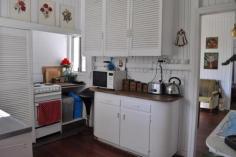  138 Franklin Dr Mudgeeraba QLD 4213 $349,000 to $369,000 Cute as a button! Cheapest home in Mudgeeraba with lots of options to extend or build. Presently rented at $340 per week offering a solid long term investment. Original workers Cottage/Queenslander oozing charm & character. Timber floors, high ceilings, old country style kitchen, main bathroom & separate toilet, front & rear timber deck & single garage. A very useable fully fenced block with a large shade house in place for the gardener and lots of room to add improvements at any stage in the future.  A wonderful opportunity to acquire something with real history and potential. Close to all amenities including walk to transport, schools, child care, parks, shops etc. Other features: Built-In Wardrobes,Close to Schools,Close to Shops,Close to Transport,Garden Property Details Elders Property ID: 8532881 1 bedrooms 1 bathrooms 1 car parks Land Area 579 square metres Single garage 