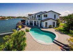  133 Sundance Way Runaway Bay QLD 4216 UNRIVALLED POSITION IN RUNAWAY ISLANDS- APPROX 108 FT OF WATERFRONTAGE This beautiful waterfront home in Runaway Bay Islands with a North East aspect enjoys one of the best blocks in the area. Massive water frontage with the ability to fit a larger vessel and other watercraft with ease. Stunning outdoor entertaining areas overlooking the wide waterways of Runaway Bay Featuring: * 4 bedrooms, 3 bathrooms * Master with balcony, ensuite, spa bath and walk in wardrobes * Approx 108ft of water frontage * Sunken formal lounge and formal dining * Spacious kitchen with informal dining area * Family room * Additional rumpus room complete with built in bar * Covered outdoor living * Inground pool overlooking the water * Pontoon with power and water * Secure double car accommodation * Vast timber deck overlooking the wide waterways * Air conditioned throughout, video intercom and alarm system in place This unique property is available with vacant possession so act fast. Your love affair with the water starts here in this idyllic waterfront setting. For further information or to arrange your viewing, simply call me today. Peter McLaren image: chrome-extension://lifbcibllhkdhoafpjfnlhfpfgnpldfl/call_skype_logo.png0404 498 503   Property Snapshot  Property Type: House Aspect Views: Water Views Construction: Rendered Block Land Area: 758 m2 Features: Alarm Balcony Built-In-Robes Close to schools Close to Transport Decking Dining Room Dishwasher Ensuite Family Room Formal Lounge Fully Fenced Yard Garden Shed Gas In-Ground Pool Internal Access via Garage Landscaped Gardens Outdoor Living Powder Room Remote Control Garaging Rumpus Room Security Gate Security Screens Spa Storage Undercover carport Undercover Entertainment Area Video Intercom Walk-In-Robes Waterfront Waterview 