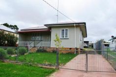  178 Grafton St Warwick QLD 4370 $249,000 Great Investment Recently Renovated Recently fully renovated with no work to do New paint work from the roof down Inside has new paint work, new carpets and floor coverings 3 bedrooms  New kitchen Separate lounge with RC air conditioning 2 bathrooms, 2 toilets and large laundry Large concreted undercover area DBL garage with DBL carport, fully fenced yard on 911 sqm New electrical wiring and plumbing throughout Other features: Close to Schools,Close to Shops,Close to Transport,Garden,Secure Parking,Terrace/Balcony Property Details Elders Property ID: 9270798 3 bedrooms 2 bathrooms 2 car parks Land Area 911 square metres Double garage Air Conditioning 