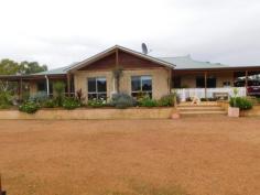  2 Lord St Popanyinning WA 6309 $450,000 THE POSH CORNER AT POPO Located in the peaceful township of Popanyinning approximately 1 1/2hrs from Perth is this stunning home on 5 acres of land. The large and spacious home boasts 4 bedrooms with built-in-robes, formal lounge, enormous family living/meals area and a deluxe kitchen with granite tops and large pantry. There are wide verandahs all round and the home has air conditioning, log fire, timber floors and high ceilings, which all combine to make it a stunning home. There is a large barn shed for the handyman and 5 acres of land for all the pets.  This is really a special property. Property Details Elders Property ID: 8837872 4 bedrooms 2 bathrooms 3 car parks Land Area 5 acres Double garage Single carport 