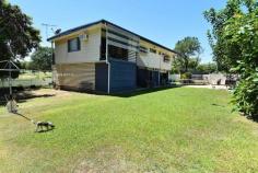  66 Baker St Richmond Hill QLD 4820 $298,000 **EXCLUSIVE AGENCY**UPDATED 4 BEDROOM FAMILY HOME IN RICHMOND HILL** Property ID: 3689058 Inspection Times: Saturday 12 March at 12:00PM to 12:45PM Exclusive Listing This home is solid as a rock. 66 Baker Street is a standout high set home sure to please any family or astute investor. Location wise this property is exemplary, not only is it situated in Richmond Hill it is within walking distance to schools, beautiful parklands, eventide retirement village and the CBD. Also there are no neighbours on one side as there is a seasonal football field.  Internally the home has been well appointed with a centrally positioned kitchen and spacious dining and lounge with stunning polished timber floors and front and back veranda access. With 4 spacious bedrooms and a beautifully updated bathroom this house will cater for any family very comfortably. Entertainment wise you have the entire downstairs area, which has a built in bar area with space for fridges, this area has a tremendous amount of storage space as well as a laundry area. Futuristically there is the possibility of creating an extra bedroom or built in living area if required for the growing family. Situated on a secure manicured block this home is well worth your time inspecting, contact Raine & Horne Charters Towers today. Features: Block: 1042m2 Fully fenced with double lockable gate access. Kitchen/Dining/Lounge: Open planned, spacious, well-appointed kitchen, front and rear veranda access. Bedrooms: 4 Spacious bedrooms, Master, 2nd and third have built ins, all have a/c and carpet. Bathroom: very modern bathroom fully tiled with double vanity and full length mirror as well as tiled shower recess  and second built in cupboard and mirror. Separate toilet. Veranda’s: Front and rear timber veranda’s, rear has internal staircase and front has stairs to main yard area. Entertainment/Rumpus: Huge area with built in bar area and the option of fully enclosing to create second living  area or granny flat. Laundry: downstairs internal location. Carport: single lockable carport underneath house with Roller door and concrete driveway. This is a very neat property in a prime position, Contact Lisa Palmer at Raine & Horne to arrange your inspection on  0438 852 136. Land Area 	 1,042.0 sqm 