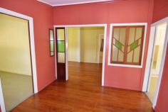  23 Baker St Richmond Hill QLD 4820 $195,000 **EXCLUSIVE AGENCY**SPACIOUS COTTAGE IN RICHMOND HILL** Property ID: 9339974 Inspection Times: Saturday 12 March at 02:30PM to 03:15PM Exclusive Listing If its ease of living you are looking for than here it is. 23 Baker Street is a beautiful 2 bedroom cottage style home located in the sought after area of Richmond Hill. This home boasts many features including a modern kitchen, spacious updated bathroom, centrally positioned living room with stunning timber floors and historical features of yesteryear. Both bedrooms are positioned to the front of the home and there is also a timber balcony to the front and a large undercover rear patio great for entertaining. Externally the home has a well maintained yard with established trees and shrubs, there is also a single undercover carport plus a fully lockable tool shed. This property is fully fenced with double lockable and single front gate access from the street. This property is also Walking distance to the reputable education facilities and local park lands. Features: 1012m2 Fully Fenced Block. Kitchen/Dining: Combined, spacious with modern kitchen, lino floor coverings and box a/c. Lounge: Formal lounge with polished timber floors ceiling fans and box a/c plus space for a study area. Formal entry with timber features and attributes, and access to front timber deck. Bedrooms: 2 generous bedrooms, both with a/c and master has large built in wardrobe. Bathroom: Very spacious with near new shower over bath, wall tiles, large vanity and mirror plus additional walk in  linen and storage room. Rear patio/bbq area: lovely space fully undercover overlooking rear yard and gardens. Shed: lockable tool shed with work benches. Carport: single undercover carport with concrete driveway and double lock up gate. Laundry: located off the patio, very large room with space for chest freezers or additional storage. Steel Stumps. This is a very neat and tidy package and positioning is exemplary, Contact Lisa Palmer today on 0438 852 136 and arrange your inspection. Land Area 	 1,012.0 sqm 