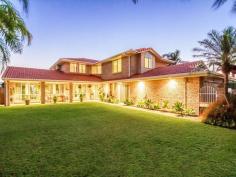  6 Salamander Ct Mermaid Waters QLD 4218 $1,195,000 Waterfront Home for Family Fun & Entertaining a Crowd. Property ID: 9333802 Have you been seeking a large home to cope with the whole family & your friends? Here is that real family home that has been loved by a big family with in-laws and grand-children and friends all together at times. The massive indoor living areas that perfectly link to the protected terrace has managed with them all!  You will surely be impressed by the way it is presented and also appreciate just what a comfortable home this is to live in. Spaces for everyone. The 1/4 acre block has seen many a cricket match, fish caught off the jetty and many pool parties. With 20 metre frontage to the wide waterway, you can keep your boat moored ready to go out to the ocean. The amount of storage in this home is so abundant and there is a large, secure storeroom off the garage which makes a perfect ‘man-cave’ for those with a hobby. All this can be yours…….. Bedrooms x 5 Study Bathrooms x 3 Living rooms x 3 Big kitchen with casual dining overlooking the pool Air conditioning Security system  Intercom at gated entry Vacuum Maid Large covered Outdoor Entertaining area Room for caravan or boat Pontoon Here it is, nestled in an easy-care, fully fenced block in a quiet cul-de-sac with easy access to schools and Bond University. It is approximately mid-way between Robina Town Centre and Pacific Fair for shopping choices. ‘Paradise Quays’ is considered as the upmarket precinct in Mermaid Waters and you are surrounded by homes of the same superior quality. Do come and explore what can be your new home! Land Area 	 1,049.0 sqm 