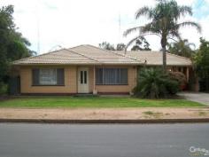  18 Ronald Street Port Pirie SA 5540 $255,000  STYLISH SOLID BRICK HOME! This beautifully presented solid brick home is well worth a look. The home presents as 3 good size bedrooms all with built-in wardrobes and ceiling fans, spacious lounge complemented with gas log fire, reverse cycle air-conditioning and downlights. The recently renovated tiled bathroom provides a separate bath, shower alcove and vanity. The lovely tiled kitchen and adjoining meals area offers modern benchtops, new stainless steel cooker and ceiling fan. Other features include a modern tiled laundry with built-ins, separate toilet, polished floors, lovely décor throughout with feature walls, quality window treatments, fixtures and fittings. Externally, the large allotment of approx. 963.00 sqm provides a rear verandah, carport under the main roof, cubby house and a big plus is the stylishly lined garage with tiled floor and reverse cycle air-conditioning ideal for the very popular 'man cave' or teenagers retreat. Located in a nice quiet central location. Ring Now! PROPERTY DETAILS $255,000  ID: 357608 Land Area: 963 m² Zoning: Residential 