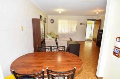  45 Cambridge St Charters Towers QLD 4820 $265,000 **IMMACULATE FAMILY HOME & SHED PACKAGE CLOSE TO CBD** Property ID: 2173618 Just a short distance from the Charters Towers CBD is this well presented 3 bedroom block family home and shed package on a 1003m2 Block. Internally the home is open planned and well-appointed and spacious and features open planned living areas and generous bedrooms, the home has ducted evaporative air-conditioning throughout for comfort during the warmer months plus the master bedroom has an additional box air conditioner. Entertainment wise the home features a front verandah which leads into a double carport which would double as the entertainment, rumpus or play area or there is the huge 3 bay Colorbond powered shed with full length awning.  Outside the home there is manicured lawns and established gardens and the block is fully fenced with steel fencing and 2 x double gates both lockable. This property truly is well worth your time inspecting and definitely caters for all members of the family. Location is impeccable as it is just a short distance to the CBD, Sporting facilities as well as reputable education facilities. Contact Raine & Horne Charters Towers today and arrange and appointment. Features: Block: 1003m2 fully fenced with lockable gate access to both carport and shed area. Home: Masonary block construction. Bedrooms: 3 Spacious Bedrooms, Evaporative a/c throughout, master has built ins plus additional box a/c and  remaining bedrooms have room for built ins. Kitchen/Dining/Lounge: Spacious, open planned, front verandah access as well as rear yard access from dining, ducted  evaporative a/c throughout. Kitchen has plenty of cupboard and bench space and overlooks the rear yard. Laundry: Internal laundry with double stainless tub, outside access and room for built-in storage. Bathroom: Tiled bathroom, with built in linen cupboard, shower over bath recess, vanity, separate toilet. Carport: double carport with lockable storage facility. Carport could double as an entertainment or undercover area  as there is additional off street parking at the shed. Shed: State of the art 3 bay powered Colorbond shed with 3 roller doors and full length awning. Security Screens throughout. Solar hot water. Here is an opportunity to secure a practicle solid spacious family home with killer shed and yard area so close to the CBD. Contact Lisa Palmer on 0438 852 136 ASAP as this property will not last long. Land Area 	 1,003.0 sqm 