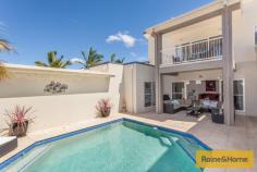  62 Azzurra Dr Varsity Lakes QLD 4227 $799,000 - $839,000 Luxurious Family Home Designed for Seamless Indoor/Outdoor Living. Property ID: 9220351 This immaculate 5 Bedroom (or 4 plus Study/Office) home is located on the prestigious Azzurra Island in the heart of Varsity Lakes. Built by award winning builders, this unique residence has an excellent layout and offers complete privacy for swimming & sunbathing. This architecturally designed home has a unique U shape so the majority of living spaces and bedrooms overlook the tranquil outdoor entertainment area poolside. If alfresco dining and family barbeques are for you, the spacious covered entertainment area is in the heart of the home with indoor/ outdoor living in mind. This is also within handy reach to the upmarket kitchen with stone bench tops and imported stainless steel appliances. There is a large split system air conditioner in the dining / family room and both the formal and informal living have high ceilings. These can also be closed off so everyone can enjoy some peace or privacy. Tucked away behind the family room are the guest quarters. The study is located just off the entry foyer and has ample storage under the staircase. Adjacent to the entry foyer is 2 spacious bedrooms with ceiling fans and mirrored built in robes. The main bathroom between these rooms is large with double vanities, quality fixtures and a separate toilet. There is also ample storage with a walk in linen closet. Internal access is via the auto double lock up garage. The grand master suite is located upstairs and is a peaceful haven for parents encompassing an En-suite of grand proportions featuring a luxurious spa bath. Step outside to a large balcony showcasing Burleigh to Surfers skyline views, enticing at dusk, just serve with wine. The outdoors is designed with a low maintenance tropical landscape garden so you can enjoy more time in the pool which features a spa bench with jets so you can sit back and relax. The island has a casual peaceful environment and yet you’re only minutes’ drive away from all the, Cafs, Shopping areas, Bond Uni and in the catchment zone for all Varsity Campuses. If privacy and ease of living is a must, come discover what this home has on offer as homes on the Island are rarely available. This is all located with easy access to beautiful walkways through parkland that is lakeside. This is the first time this home is offered for sale and the sellers instructions are to present all written offers within the price range! 
