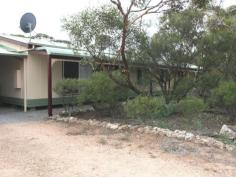  17 Ninnes Road NINNES Section SA 5560 $219,000 BUSH RETREAT WITH GREAT RURAL VIEWS Private, peaceful, and not near other people or places, this property is true to the meaning being set in and around a wooded allotment. The timer frame home consists of 3 bedrooms the master bedroom being very large, modern old world charm bathroom with bath, shower and vanity separate w/c, good kitchen, open lounge - dining room with slow combustion heating and ducted evaporative a/c. Outside has a large elevated deck overlooking the Barunga Ranges, large carport, 2 shipping containers one converted into the laundry and the other a work room. This home is set on a 3.5 acre allotment and is beautifully presented. RLA:1955   Property Snapshot  Property Type: House on acres 