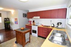  66 Baker St Richmond Hill QLD 4820 $298,000 **EXCLUSIVE AGENCY**UPDATED 4 BEDROOM FAMILY HOME IN RICHMOND HILL** Property ID: 3689058 Inspection Times: Saturday 12 March at 12:00PM to 12:45PM Exclusive Listing This home is solid as a rock. 66 Baker Street is a standout high set home sure to please any family or astute investor. Location wise this property is exemplary, not only is it situated in Richmond Hill it is within walking distance to schools, beautiful parklands, eventide retirement village and the CBD. Also there are no neighbours on one side as there is a seasonal football field.  Internally the home has been well appointed with a centrally positioned kitchen and spacious dining and lounge with stunning polished timber floors and front and back veranda access. With 4 spacious bedrooms and a beautifully updated bathroom this house will cater for any family very comfortably. Entertainment wise you have the entire downstairs area, which has a built in bar area with space for fridges, this area has a tremendous amount of storage space as well as a laundry area. Futuristically there is the possibility of creating an extra bedroom or built in living area if required for the growing family. Situated on a secure manicured block this home is well worth your time inspecting, contact Raine & Horne Charters Towers today. Features: Block: 1042m2 Fully fenced with double lockable gate access. Kitchen/Dining/Lounge: Open planned, spacious, well-appointed kitchen, front and rear veranda access. Bedrooms: 4 Spacious bedrooms, Master, 2nd and third have built ins, all have a/c and carpet. Bathroom: very modern bathroom fully tiled with double vanity and full length mirror as well as tiled shower recess  and second built in cupboard and mirror. Separate toilet. Veranda’s: Front and rear timber veranda’s, rear has internal staircase and front has stairs to main yard area. Entertainment/Rumpus: Huge area with built in bar area and the option of fully enclosing to create second living  area or granny flat. Laundry: downstairs internal location. Carport: single lockable carport underneath house with Roller door and concrete driveway. This is a very neat property in a prime position, Contact Lisa Palmer at Raine & Horne to arrange your inspection on  0438 852 136. Land Area 	 1,042.0 sqm 