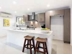  39 Mingaletta Dr Ashmore QLD 4214 $675,000 - $725,000 Seeking a Home with the Wow Factor? Look No Further! No expense has been spared in this amazing renovation, its the little extras that make the extraordinary difference in this gorgeous contemporary residence. Featuring an oversized grand timber door entrance flowing onto a custom built solid timber staircase that leads you into the large air conditioned open plan living area which incorporates indoor/outdoor living effortlessly. Houses of this calibre in this price range have been flying out the door so please don't delay as this beautiful abode will be no different! * Huge mastersuite with full length walk in robe and fully renovated ensuite * Oversized 4th bedroom with high raked ceilings (could be used as a second living area, children's retreat or home office) * Enormous chefs kitchen with stone benchtops, 2pac cupboards, gas cooktop and large breakfast bar * Beautiful second bathroom with freestanding bath, large shower.  * Powder room with direct access from outside to avoid water from the pool being walked through the house * Large undercover outdoor area with bar/servery overlooking the in-ground swimming pool * Lots of grassed areas for the children or pets throughout the large 790m2 allotment * Brand new colorbond roof with new insulation and warranty * Double lock up garage with new Pirie electric double door * New LED lighting and ceiling fans throughout 