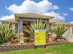  26 Landsdowne Dr Ormeau Hills QLD 4208 $554,000 Beautifully Presented Ex Display! If you are after a quality built home with all the extras you can not look past this beautiful property located in the Ormeau Ridge Estate. Nestled at the top of the ex display street you are surrounded by quality properties as well as just a short stroll to the very popular Hill Top Park. Hallmark the builders have not held back with this design bragging extra high ceilings and tall doors to suit, large porcelain tiles throughout, a very stylish kitchen with butlers pantry and fully ducted air conditioning, you will be hard pressed finding a better buy in the estate! In addition to this quality home you will find a relaxing remedial spa capturing gorgeous views of the beautiful Ormeau Hills countryside. Some of the other features include: * Master bedroom with walk in robe and en suite * Study at the front of the house * 2 Good sized bedrooms * Separate media room * Stylish kitchen with stone bench's, twin ovens with ceramic cook top and a butlers pantry * Open plan living and dining area * Rumpus leading onto outdoor alfresco area * Modern main bathroom with separate toilet * Walk in linen and separate laundry * Ducted air conditioning throughout * Pocrcelain tiles and upgraded carpet in bedrooms and media * Garden shed * Spa with Bali hut * Fully insulated as well as tinted windows for comfort all year round * Security system and security screens installed * 540m2 block with views of the bushland and good yard space for kids and pets. * Double lock up garage Be quick to arrange an inspection as this property will not last long! Disclaimer: We have in preparing this information used our best endeavours to ensure that the information contained herein is true and accurate, but accept no responsibility and disclaim all liability in respect of any errors, omissions, inaccuracies or misstatements that may occur. Prospective purchasers should make their own enquiries to verify the information contained herein. 
