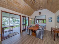  75-77 Tramican Street Point Lookout QLD 4183 $2,300,000 Both blocks are a total of 1,800m2 and have wonderful beach, bush and ocean views. The large architecturally designed house has a two car lock up garage at street level which links to the house with a timber walkway. The garage building has a large loft area - perfect for a craft room, office or even a separate studio bedroom and lockable storage areas underneath. The main house has two levels with all living areas on the top level.  There is a formal lounge area on entry, large open plan kitchen with walk in pantry plus formal dining - all opening onto a covered deck. There are two bedrooms and a bathroom on this level also.  The bottom level has three more bedrooms including the master bedroom with walk in robe and en suite bathroom, a second bedroom also has an en suite with spa bath and there is a small bunkroom The separate laundry with large storage area (perfect for a wine cellar) has direct access to the garden. 