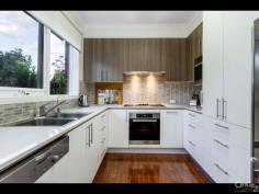  49 Grantley Dr Glen Waverley VIC 3150 PERFECT BLEND FOR INDOOR / OUTDOOR LIVING Auction Details: Sat 16/04/2016 02:00 PM Inspection Times: Thu 07/04/2016 04:30 PM to 05:00 PM Sat 09/04/2016 12:15 PM to 01:00 PM This beautifully presented family home on a corner allotment has outstanding warmth and charm with full of natural light to complimented this superb residence.  From the moment you enter the home you will no doubt be impressed with the quality and attention to detail from the elegant lounge / formal dining room to the stunning newly renovated kitchen with stone benchtops. Quality appliances have been used throughout with an abundance of built-in-cupboards. Four good-sized bedrooms with built in robes, two renovated bathrooms and two toilets.  Extras include gas ducted heating, alfresco area and three further entertainer's areas, double carport and extra parking area for boats, caravans or trailers.  Situated close to the Glen Shopping, Private Schools, Highvale Secondary College, Trams and close to the Monash M1 and Eastlink Freeways.  PROPERTY DETAILS AUCTION  Fantastic Family Home  ID: 363253 