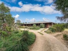  60 Sandergrove Rd Strathalbyn SA 5255 $395,000-$415,000 Undeniably Unique Property ID: 9578288 Centrally positioned on 2313sqm of spacious land is this 5 bedroom, 2 bathroom home. The slightly elevated site has views to the near hills and established local native vegetation that provides a high level of privacy. Within walking distance to the town centre this unique property ticks certain boxes that others just can’t tick.  A complete wrap around verandah keeps the sun off the windows and the home feeling comfortable without compromising the amount of beautiful natural light. 2.7m high ceilings and 2.4m doorways give the home a spacious feel. The artistic flare of the current owner shines through the home with bright and vibrant colours throughout.  The open living area is the central hub of the home and overlooks the native rear garden. The kitchen has a walk in pantry and an industrial style island bench. A formal lounge offers versatility for a play room, TV room or home theatre.  The industrial style continues with a slow combustion fire putting out natural heat and a painted concrete floor providing thermal mass and temperature comfort. All the bedrooms are a great size and have provisions for built in robes while the master has the luxury of a walk through his and hers walk in robe, ensuite and direct access to the outdoor verandah.  The whole yard is complete with low maintenance native vegetation including native grasses and plants. Rain water is cleverly connected to several self filling and emptying ponds. Topping off a long list of features is a 1kw solar system. This unique property is a great place to call home. Land Area 	 2,313.0 sqm 