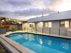  39 Mingaletta Dr Ashmore QLD 4214 $675,000 - $725,000 Seeking a Home with the Wow Factor? Look No Further! No expense has been spared in this amazing renovation, its the little extras that make the extraordinary difference in this gorgeous contemporary residence. Featuring an oversized grand timber door entrance flowing onto a custom built solid timber staircase that leads you into the large air conditioned open plan living area which incorporates indoor/outdoor living effortlessly. Houses of this calibre in this price range have been flying out the door so please don't delay as this beautiful abode will be no different! * Huge mastersuite with full length walk in robe and fully renovated ensuite * Oversized 4th bedroom with high raked ceilings (could be used as a second living area, children's retreat or home office) * Enormous chefs kitchen with stone benchtops, 2pac cupboards, gas cooktop and large breakfast bar * Beautiful second bathroom with freestanding bath, large shower.  * Powder room with direct access from outside to avoid water from the pool being walked through the house * Large undercover outdoor area with bar/servery overlooking the in-ground swimming pool * Lots of grassed areas for the children or pets throughout the large 790m2 allotment * Brand new colorbond roof with new insulation and warranty * Double lock up garage with new Pirie electric double door * New LED lighting and ceiling fans throughout 