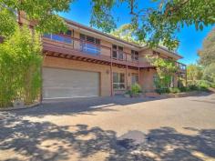  31 Crane Ave Coromandel Valley SA 5051 $650,000-$680,000 FIRST OPEN INSPECTION THIS SUNDAY 2:15PM TO 3:00PM * You will certainly feel like you’re up in the clouds with this property. Nestled on the hill with only one close neighbour, you will enjoy the peace and tranquility this wonderful home has to offer, with views to the Gulf and Yorke Peninsula. Set on over 3,600sqm of land, this home is surrounded by established gardens and pathways. For those that enjoy outdoor entertaining, you will love this one – with a paved undercover area, sound system, and dimmable lighting, your guests will be impressed. This two-storey home comprises 5 bedrooms, 3 bathrooms, 2 dining areas and 2 living rooms. On the ground level are 2 bedrooms, both with built-in robes and bathroom all renovated so no work to be done down here. These two rooms share a large entertaining area, perfect for those with teenagers they’d have their own wing of the home. There is also a huge storage room, looks much like a man-cave and I’m sure this will impress most blokes! With additional storage under the stairs and direct access to the double garage, there is no shortage of space to store your added belongings. Upstairs you are welcomed to a large open plan kitchen, meals and family room; all enjoying the surrounding views of the valley. The oak kitchen with double-aspect windows, dual sink, dishwasher, wall oven, large pantry, and an abundance of cupboard and bench space, makes working in the kitchen an enjoyable experience.  The guest bedroom or 4th bedroom, adjacent to the kitchen, provides built-in wardrobes, ceiling fan, full size bathroom with separate toilet and wall-to-wall cupboards for storage. The family room offers a slow combustion heater perfect for those cold winter days, and reverse-cycle air-conditioning for year round comfort. With access to the balcony and the back garden, this is definitely the heart of the home. Further on you will find the open sitting room that leads on to the master bedroom which provides a walk-in robe and en-suite. The formal dining room also overlooks the balcony and has a beautiful handcrafted blackwood wall unit to stay with the property.  The 5th bedroom, located next to the master bedroom is perfect to use as a nursery, home office or study.  Additional features include:- - Alarm system - Automatic roller door to the double garage - Ambient lighting around the outdoor entertaining area - Sensor lights around the home - Vegetable garden area - Irrigation to the surrounding gardens - Power to the large shed/workshop in the back yard - Fire tank and pump - Large chook house and tool shed - Orchard with apricot, peach, apples and nectarine trees. This home will suit growing or extended families and those who enjoy nature. Building / Floor Area 	 242 sqm Land Area 	 3,665.0 sqm 