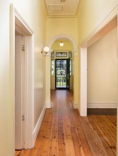 18 Wellington Rd Mt Barker SA 5251 $449,000-$469,000 Circa 1900 Stone Residence on 1,372sqm - Prominent Location! Property ID: 6349805 A prime position and location, opposite the Mount Barker Showgrounds and Sports Complex. The huge 1,372sqm allotment offers great potential for subdivision or further development (subject to all necessary Govt. consents). The stone residence was built in 1900 and offers great street appeal and character, with classic picket fence, bullnose front verandah, turned timber posts, and brick quoins around the windows and front door. Entering the central hallway, there are lofty 11’ ceilings with embellished archway. The Baltic timber flooring adds to the character, and continues down through to the living area and kitchen. There are three bedrooms (plus the studio), each with television points and two of these rooms offer fireplaces with ornate timber surrounds. There are ceiling roses in the hallway and a few of the rooms. The family lounge offers slow combustion log fire with a heat transfer system, one bedroom also has a gas bayonet connection, and there is an LG reverse cycle split system air conditioner. The eat-in kitchen offers great cupboard space, modern Euro double wall oven and there are new electric hot plates. There is a double sink, fridge alcove and pantry cupboards. The laundry has water trough and outside access, and linking is the bathroom which offers bath, shower, toilet and vanity with wall mounted mirror. The rear patio verandah has been brick paved and sets the scene for outside entertaining, especially with the backdrop of the huge rear yard. There are a number of mature trees, including silver birch, ash, plus fruit trees – apricot, plum, apple and a baby nectarine. The garage complex measures approximately 7m x 9m and promotes many positive attributes, as the majority of the structure has been lined and insulated. Uses include a teenage retreat, artist’s studio, work from home space separate to the residence, show room for the collector, or a ‘sound proof’ area for the musician. There are essentially three zones – a bedroom/rumpus, a workshop and vehicle storage area. There is access to the rear yard through the garage, furthermore there is an existing concrete slab should further garaging be required. Separate to the garage is a small garden shed. An historical character residence in a prominent location. Endless possibilities abound! Land Area 	 1,372.0 sqm 