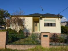  79 Inch St Lithgow NSW 2790 $310,000 NEAT FIRST HOME OR INVESTMENT Well positioned on the high side of the street, this neat family home is a large 844 square metre block will suit both owner occupiers or investors. There are 3 spacious bedrooms with built-ins (master with walk-in & ensuite), modern kitchen with gas cooking, a modern main bathroom, and an open plan living/dining area. The home also has the convenience of gas central heating throughout. The focal point of the yard is the massive covered outdoor entertainment area which offers privacy, shade and a great useable space for the whole family. The yard is fully fenced and there is a single garage and 2 single carports. There is front street and rear land access to the yard.   Property Snapshot  Property Type: House Aspect Views: westerly aspect Construction: Cladding Zoning: Residential House Size: 114.00 m2 Land Area: 844 m2 Features: Built-In-Robes Close to schools Close to Transport Dining Room Dishwasher Ensuite Family Room Fenced Back Yard Gas Lounge Storage Undercover Entertainment Area 