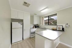  24 Ragless Circuit Kambah ACT 2902 Need More Yard? Located in Canberra’s largest suburb, only minutes to Tuggeranong Town Centre, local schools, playgrounds and parks. This recently updated ex-govie home on a HUGE 981m2 block is perfect for those looking for a bit more yard space. Lots of room for kids to run around, the cubby house, playground and even a game of backyard cricket! Fully fenced, even the dog will love all of the space.  The home itself, updated with modern laminate floating floors, neutral colours throughout and easy maintenance living. Inspect for the first time this weekend! Features: • 	 Huge 981m2 Block • 	 Recently updated home • 	 Fully fenced yard  • 	 Side access for trailer or caravan  • 	 Ducted gas heating • 	 Evaporative cooling • 	 Open plan living • 	 Easy access to local school, parks and shopping centers   Property Snapshot  Property Type: House Land Area: 981 m2 Features: EER: 1.5 
