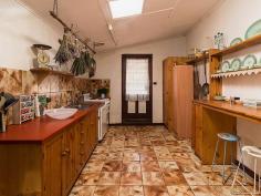  8 High St Strathalbyn SA 5255 $319,950 OPEN SATURDAY 23/4/2016 - 11AM - 11:30AM Property ID: 8668062 “Stone Gate Cottage c1860 Standing the test of time and proudly sited on historic High Street is this charming bluestone return verandah villa. The character home is positioned on a manageable 468m2 allotment within a stone’s throw to township facilities. The traditional floor plan features a spacious family lounge, formal lounge, kitchen with dishwasher, dining room, 3 bedrooms, renovated bathroom, laundry and a delightful cellar. The villa has many quality features including polished timber floor boards, operational open fireplaces with appealing surrounds, glass panelled interior doors, combustion heating and reverse cycle split system air conditioning. Attached to the rear of the home is a quaint paved outdoor living area with caf blinds ideal for year round entertaining. Further external improvements include a double carport, 6.2 × 6.3m colorbond lock up garage complete with cement floor and power and rainwater storage plumbed to the home. The location of this property, being adjacent to the northern end of the popular antique centre is well placed for many uses including Bed & Breakfast and professional services, notwithstanding the fact that the property is located within the township zone code of Residential (Strathalbyn) Precinct 23 Strathalbyn Historic Central, and any change would necessitate Council approval. Property History- John Stephens, a butcher acquired an L shaped part of Lot 38 in 1860. In 1861 it passed to William Stephens, a blacksmith. From 1866 Stephens leased the property to other blacksmiths. The section behind William Read’s allotment was sold off to Colin Thomas in 1884. The remaining part of the property was transferred to Isaac Wheadon, a blacksmith, a few weeks later. Wheadon has leased this property and part of Lot 39 from William Stephens before purchasing it. Wheadon mortgaged the property to William Stephens and Stephens gained possession later in 1884. Robert Thomas acquired the property in 1908 and it was subdivided in 1920. Henry Marshall Hall Robinson bought this part of the land in 1921. He sold it in 1923 to George Thredgold, a mason, who owned until his death in 1938. Land Area 	 468.0 sqm 