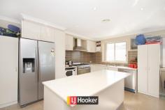  9 Dinah St Bonner ACT 2914 $580,000 PERFECT Family Home, Now Vacant! This beautiful family home is conveniently located only a short walk from the Neville Bonner Primary School and Amaroo School, there will no longer be a reason for the kids to be late for school again. The local Bonner shops (include a Woolworths) are also within walking distance to the home. The home offers both formal and informal living areas. As you enter the home you are greeted by the light and airy formal living room, the perfect place for some peace and quiet from the kids. Further down the hall you will find the open plan kitchen, meals and family room. The modern kitchen features granite bench tops, ample cupboard space, dishwasher and stainless steel appliances. Glass sliding doors lead out to the outdoor entertaining area and the easy care yard with artificial turf. The four spacious bedrooms feature mirror built in robes, and the master bedroom with a walk in robe and modern ensuite. The main bathroom also features a spa bath. The ducted reverse cycle air conditioning will ensure your family stays comfortable all year around. Features include; - 	 Four spacious bedrooms, with built in robes included  - 	 Lockable double garage, with internal access - 	 Modern kitchen and bathrooms  - 	 Stainless steel appliances - 	 Dishwasher  - Chefs oven - Crimsafe screens - Video intercom - Alarm system - Ducted Vacuum  - 	 Reverse cycle air conditioning  - 	 Low maintenance yard, with artificial turf - Views from the back deck - EER 6   Property Snapshot  Property Type: House Land Area: 405 m2 Features: Fully Fenced Ducted Vacuum System Built-In-Robes Dishwasher EER: 6.0 