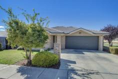  57 Ian Potter Cres Gungahlin ACT 2912 $669,950 Absolutely Immaculate Throughout With unique personality and so much more than you would expect, this perfectly maintained family home is set in a fantastic location and offers a long list of quality features. Stylish and modern in design, the flowing floor plan consists of formal and informal living areas that are flooded with natural light and will accommodate larger families who are in need of extra space. Paintwork and carpets are brand new and the home presents like a show home throughout. The open kitchen has a separate pantry and plenty of cupboard space and is perfectly located off the family room and meals area so you can keep an eye on the kids. And the bedrooms are all of a great size, the main with an ensuite bathroom and walk in wardrobe. Outdoors a covered pergola is ideal for entertaining while enjoying the privacy provided by the attractive surrounding gardens that are well established and easy care… and there is still plenty of space outside for children and pets to enjoy. Located only minutes from the popular ever growing Gungahlin Marketplace and with Yerrabi Pond and parkland a short walk away, this one won’t last long. EER 4 Some of the many features include: • 	 Four spacious bedrooms, main with ensuite bathroom and walk in wardobe • 	 Roomy formal and informal living areas • 	 Large light filled open plan family room  • 	 New paintwork and carpets throughout with a focus on tasteful neutral tones and styling • 	 Great sized kitchen with pantry and plenty of bench and cupboard space • 	 Ducted gas heating • 	 Evaporative cooling • 	 NBN connectivity • 	 Covered entertaining area  • 	 Attractive well established manicured gardens  • 	 Easy care yard yet with plenty of space for children and pets • 	 Fantastic position near to all of the amenities of the thriving Gungahlin Town Centre and with Yerrabi Pond and parkland a short walk away   Property Snapshot  Property Type: House Land Area: 495 m2 Features: EER: 4.0 