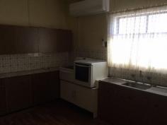  87 Redfern St Cowra NSW 2794 $175,000 IT'S ABOUT LOCATION This well presented 3 bedroom home plus 4th sleep out bed, has the flexibility to either use as a family home or run a business as the council zoning allows commercial use in this location. Good sized level block of 841m2 is easy to maintain.  - First time offering in 60 years - Walking distance to corner store - Separate lounge/oversized sunroom room - Flexible floor plan - Eat in kitchen - Vehicular access to rear - Good sized Lock up garage with separate workshop/storage  - Rental return estimate of $180.00 per week Offering a rare opportunity to capitalize on a solid house under $200,000. This property is sure to be popular with the astute purchaser.   Property Snapshot  Property Type: House Construction: Brick Veneer Land Area: 841 m2 Features: Close to schools Close to Transport Established Gardens Family Room Formal Lounge Garden Shed Town Sewer System Town Water Verandah 