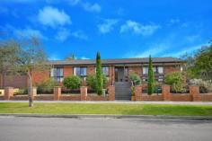 13 Darvell Cl Wheelers Hill VIC 3150 An Oasis of Relaxed Family Living The facade of this comfortable modern home resembles the restful style of a colonial house with its shady wraparound verandah. At the head of a peaceful court, the home oozes tranquillity and welcomes you into the sunny rooms offering ample accommodation and indoor and outdoor living and entertaining areas. Richly coloured jarrah floorboards are a feature, with this hardwood repeated in the kitchen cabinetry. Walk through an archway off the entrance hall into the open living room, then through another archway into the formal dining room. The kitchen (with granite benchtops and a gas cooktop) is open to the family room/meals area and has sliding doors out to an attractive private garden and alfresco entertaining area. Paving, a pergola, multiple fruit trees, and a fully imported Italian pizza oven are among the additions here. This 4 bedroom home has 2 bathrooms (an ensuite and main bathroom with spa bath) and 2 toilets. Extras include ducted heating, evaporative cooling, solar panels, alarm system, and a double garage with remote-controlled door. On an allotment of approximately 709sqm, this property is in Wheelers Hill Secondary College zone, near Jells Park, Caulfield Grammar, other schools, Wheelers Hill Village shops, buses, Eastlink and Dandenong Creek trails and Monash and Eastlink freeways, with easy access to major shopping centres, recreation, reserves and more. Price Guide: Contact Agent   |  Land: 709 sqm approx 	  |  Type: House  |  ID #533990 