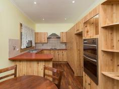  18 Wellington Rd Mt Barker SA 5251 $449,000-$469,000 Circa 1900 Stone Residence on 1,372sqm - Prominent Location! Property ID: 6349805 A prime position and location, opposite the Mount Barker Showgrounds and Sports Complex. The huge 1,372sqm allotment offers great potential for subdivision or further development (subject to all necessary Govt. consents). The stone residence was built in 1900 and offers great street appeal and character, with classic picket fence, bullnose front verandah, turned timber posts, and brick quoins around the windows and front door. Entering the central hallway, there are lofty 11’ ceilings with embellished archway. The Baltic timber flooring adds to the character, and continues down through to the living area and kitchen. There are three bedrooms (plus the studio), each with television points and two of these rooms offer fireplaces with ornate timber surrounds. There are ceiling roses in the hallway and a few of the rooms. The family lounge offers slow combustion log fire with a heat transfer system, one bedroom also has a gas bayonet connection, and there is an LG reverse cycle split system air conditioner. The eat-in kitchen offers great cupboard space, modern Euro double wall oven and there are new electric hot plates. There is a double sink, fridge alcove and pantry cupboards. The laundry has water trough and outside access, and linking is the bathroom which offers bath, shower, toilet and vanity with wall mounted mirror. The rear patio verandah has been brick paved and sets the scene for outside entertaining, especially with the backdrop of the huge rear yard. There are a number of mature trees, including silver birch, ash, plus fruit trees – apricot, plum, apple and a baby nectarine. The garage complex measures approximately 7m x 9m and promotes many positive attributes, as the majority of the structure has been lined and insulated. Uses include a teenage retreat, artist’s studio, work from home space separate to the residence, show room for the collector, or a ‘sound proof’ area for the musician. There are essentially three zones – a bedroom/rumpus, a workshop and vehicle storage area. There is access to the rear yard through the garage, furthermore there is an existing concrete slab should further garaging be required. Separate to the garage is a small garden shed. An historical character residence in a prominent location. Endless possibilities abound! Land Area 	 1,372.0 sqm 