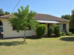  71 Burg St East Maitland NSW 2323 MASSIVE GARAGE + 1012SQM BLOCK This Solid residence is located in a great central area and is set on a very impressive on 1000sqm WITH SIDE ACCESS to a massive shed that you will just LOVE. Currently leased to excellent tenants and returning a strong $380 per week, this h/p and tile home would make the ideal investment or owner occupier, depending on your needs. Well finished throughout with 4 bedrooms, two bathrooms and two large and separate living areas. East Maitland is a fantastic location and with the recently announced works totalling some $370M already commencing on the nearby shopping centre, capital growth is sure to be your friend here. Contact Todd Fisher or Ben Cotton for all details.   Property Snapshot  Property Type: House Construction: Hardiplank Land Area: 1,042 m2 Features: Close to schools Close to Transport Dining Room Dishwasher Ensuite Family Room Gas Lounge Polished Hardwood Floors Sewer Connected Side Access Storage Town Water Walk-In-Robes 