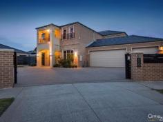  8 Possum Pl Pakenham VIC 3810 $750,000 JAW DROPPING IN EVERY RESPECT The vendors of this amazing property set out to create something special. One inspection from even the fussiest of buyers will score them a perfect 10 for their efforts. With around 50 squares of what has to be one of the best homes in the shire, this Porter Davis master piece has everything. Entry to the property is via remote electric sliding gate. Once you enter the home you will notice the attention to detail and quality everywhere. There are 4 bedrooms plus study, 4 bathrooms plus powder room, master ensuite with spa bath. All bedrooms have walk in robes. There are 5 living areas including theatre room. Move through to the stunning kitchen where you will find a massive island bench, stone counter tops everywhere, 900mm stainless cooking with glass splash back. Then you have another gas cook top in the full butlers pantry. The outdoor entertaining is massive to handle the biggest of gatherings. From here you have direct sight of the salt water solar heated pool with waterfall. All this on a massive 1,019m2 (approx) allotment.  The home has full climate control, multi panel solar electricity, triple garage and enough room to park any number of large trailers behind the security gates. PROPERTY DETAILS NEG OVER $750,000 ID: 366074 Land Area: 1019 m² 