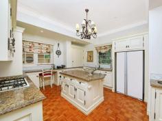  19 Warwick St Killara NSW 2071 Magnificent Family Living in Size, Quality and Beauty Find yourself immersed in the comforts of this stately Mediterranean style home on approximately 6,007sqm of sprawling lush gardens and level lawns. Private driveway to it's elevated position enhances glorious outlook of picturesque park like grounds for friends and family entertaining on mass. Circa 1938 designed by F. Glynn Gilling showcases splendour and quality craftsmanship over two palatial levels, the "WOW" factor from foyer leading to the formal lounge with moire silk adorned walls, gas fireplace and bay windows with French doors to enjoy the view off an alfresco north facing terrace is priceless. Adjoining this covered terrace a sitting/piano room. Recreation plus is the north-south championship size tennis court. Double brick built with finesse & quality in mind. Romanticism in the air, the home offers an exquisite staircase, soaring ceilings with decorative cornices, period lighting, window drapes and shellac textured walls. Delightful conservatory, 2 powder rooms and superbly appointed kitchen with granite bench tops and parquetry flooring add a touch of class. Main bedroom boasts a spa ensuite, walk-in robe and sun-drenched balcony whilst on the same level other bedrooms ideal for growing family, au pair living are spacious in size include wardrobes, large framed colonial windows capturing the wonderland outside.  Uniquely occupying 3 titles with rear gate pedestrian access in one of the more quiet and private pockets of Killara, ample off street & garage parking and double carport. This property is a must see! Close vicinity to Chatswood, Sydney CBD, convenient short 5 mins walk to Killara Primary School, Killara Station and 10 mins to Ravenswood Girls, nearby select schools, golf courses, restaurant establishments and major shopping centres. To view contact Lavenia Liu 0413 555 017 DISCLAIMER: All information contained herein is gathered from sources that we believe reliable. We have no reason to doubt its accuracy, however we cannot guarantee it. This information is not to be used in formalising any decision nor used by nor used by a third party without the expressed written permission of LJ Hooker Gordon.   Property Snapshot  Property Type: House Construction: Double Brick Features: Alarm Built-In-Robes Ensuite Established Gardens Fenced Back Yard Granite Benches Parquetry Floors Storage 