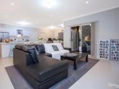  60 Windermere Blvd Pakenham VIC 3810 $495,000 LAKE FRONTAGE & IMMENSELY PRIVATE! WATER VIEWS, PINNACLE LOCATION & RARE OPPORTUNITY.  The moment you arrive at this stand out home in Cardinia Lakes a sense of calmness and pride is immediate.  Proudly built by Fairhaven Homes, this 4 double bedroom home, master suite with water views, ensuite and walk in robe, built in robes to the other bedrooms for maximum convenience, living space is abundant with a family room, separate oversize theatre / rumpus along with outdoor living space.  Well appointed kitchen with stainless trim appliances, large breakfast bar, walk in pantry and dishwasher, adjoining open plan meals / dining space is clever.  Features include double remote garage with internal access & rear roller door, ducted gas heating, split system cooling, security system, timeless colour scheme, built in cabinetry to the laundry, above standard ceiling height, security doors and sensibly tiled in all the traffic spaces along with carpet in the bedrooms for comfortable family living.  Outside the pergola is a jaw dropper with its high span and grand size, absolutely perfect for the largest of gatherings or will equally be enjoyed when one needs to chill out and appreciate relaxing in your own private haven, with further outstanding views out to Western Port from the rear of the property, this certainly provides a very unique offering by capturing absolute lake frontage enjoyment and the exclusivity that this provides along with glorious rear views is absolutely superb.  Fully landscaped front and rear, additional street parking, walking & bike tracks at your front door, outdoor gym circuit & fountain lake a very short walk, transport, Cardinia Lakes shopping centre with big retailers and specialty stores just a stroll away.  Make the move, this is a very rare offering in a pinnacle location, unreplaceable at this level!  PROPERTY DETAILS NEG OVER $495,000 ID: 362557 Land Area: 576 m² 