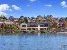  84 Henley Marine Dr Rodd Point NSW 2046 Luxurious Residence with Panoramic Bay and City Views Built to discerning standards, this landmark waterfront home has been crafted to take full advantage of panoramic views over Iron Cove and the city skyline. Designed by renowned architect Peter Lufi to mirror the curves of the bay, it combines a house-like layout with the convenience of apartment style living and features a flexible layout easily reconfigured for dual occupancy. Right on the doorstep of the Bay Run and Rodd Park, its grand interiors, high-end finishes and never-to-be-built-out views create a spectacular residence.  * Expansive upper level living bathed in northerly sun * Entertainer's custom granite kitchen, walk-in pantry * Deep terraces, Vergola, dazzling unobstructed views * 4 bedrooms with built-ins, Villeroy & Boch baths * Master with walk-in robe and large marble ensuite * Versatile lower level with 2 beds, living & courtyard * DLUG (internal access), storeroom, gated drive * Powder room, huge laundry, ducted air and vacuum * Exclusive waterfront setting, easy access to the CBD Inspections are strictly by appointment. All information contained therein is gathered from relevant third party sources. We cannot guarantee or give any warranty about the information provided. Interested parties must rely solely on their own enquiries.   Property Snapshot  Property Type: House Construction: Double Brick Features: Balcony Built-In-Robes Cable Television Close to schools Close to Transport Ensuite Internal Access via Garage Storage Study Undercover Entertainment Area Walk-In-Robes Waterview 