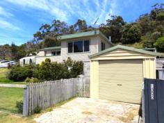  1000 Adventure Bay Rd Adventure Bay TAS 7150 $359,000 It Could be a 1000 Miles Away This unique property is situated in a location which does not become available very often, close to the National Park and directly opposite the beach. This fully furnished 3 bedroom home which backs onto a reserve includes a garage, sheds and ample water supply. You or your holiday makers are able to move in immediately as we have included the fridge, microwave, washing machine, double beds and bunks. Maybe the undercover BBQ area is all you need when fishing and boating in Adventure Bay. With a deck running across the front of the home, with access from the family room and master bedroom, you can enjoy the surrounds and water views in comfort. House Size 106 sqm (approx) Land Size 1068 sqm (approx)   Property Snapshot  Property Type: House Aspect Views: Expansive water views Construction: Colorbond Zoning: 5059001 Features: Built-In-Robes Coastal Decking Family Room Fully Fenced Yard Furnished Garden Shed Storage Undercover Entertainment Area Waterview Wood Heating 