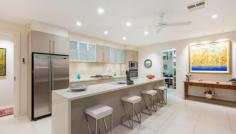  18 Evadell St Gungahlin ACT 2912 Location, luxury & livability Auction to be held on Saturday 30th April 2016 at 10:00am onsite Have you been thinking about building because you just can’t find the quality that you’ve been looking for? You must do yourself a favor and visit this outstanding family home that not only ticks all the boxes for ultimate easy family living but is in better than new condition. With loads of livability features (listed below) along with design features such as 9 ft ceilings, stunning kitchen, segregated living spaces, stunning alfresco and outdoor living spaces you can really call this property Home. The current owners have put a great amount of thought into the lighting throughout the home, the soft furnishings, flooring choices and lots of little touches that really give the home a gorgeous character. Once you’ve settled in and are ready to leave home you find Yerrabi Pond just a stroll away, have coffee or a meal at the local cafes and restaurants. The Gungahlin region is spoilt for great schools, shopping and lifestyle facilities. The owners have made the difficult decision to down size, so please do not delay your inspection or please call Kaylene or Andrew to discuss this absolute gem. Livability Features;  - 	 North facing living areas - 	 In slab zoned Hydronic heating - 	 LED lighting throughout - 	 Ceiling fans in bedrooms and main living areas - 	 Solar panels; 3.1 KW - 	 Solar hot water - 	 Underground rain water tank, pumped to toilets - 	 Low water gardens Other Property Features; - 	 From the covered portico step into a wide entry hall with high ceilings - 	 The home has 2.7meter ceilings throughout - 	 The formal living & dining show off the Red Gum floors plus floor to ceiling windows, gas fireplace and access to the outdoor tiled terrace - 	 The kitchen features 40cm stone bench tops, ILVE 120cm gas cook top & a 120lt oven.  - 	 You will love the walk-in pantry, the soft close feature on all the cabinetry & the integrated dishwasher  - 	 By the way… the pantry is insulated, just in case you’d like to store some wine - 	 The casual dining & family area is incredibly generous, open plan & very inviting adjacent to the kitchen - 	 Both the formal & informal spaces flow out to large covered Alfresco, great for the largest of family gatherings - 	 Ducted reverse cycle air conditioning throughout - 	 Four channel stereo system to the formal lounge/dining, living, library and alfresco areas, with individual controls for each area - 	 ‘Crimsafe’ screens to the majority of the homes doors & windows - 	 All of the bedrooms are oversized & whilst bedroom 5 is currently fitted out & serves beautifully as a library it is easily restored to a full bedroom - 	 The parent retreat is very special with a custom fitted dressing room, large ensuite with double vanity & the room opens on to the back terrace to soak up some morning sun - 	 Both bathrooms are finished beautifully with floor to ceiling tiles & quality fixtures & the main bathroom features a freestanding bathtub - 	 There is ample storage throughout the home: bedrooms, laundry, hall linen press and garage - 	 Ducted vacuum - 	 Custom joinery to the family room - 	 The professionally landscaped, easy care gardens have been well thought out, are now very well established & give privacy both front & back.  - 	 The oversized double garage gives internal access  - 	 Automatic, dripper irrigation to the gardens - 	 287sqm of living  - 	 Rates; 	 $2,142.00 per annum - 	 Land Tax; 	 $$3,281.00 per annum if rented   Property Snapshot  Property Type: House House Size: 287.00 m2 Features: Liveability EER: 5.0 