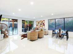  39 Mingaletta Dr Ashmore QLD 4214 $675,000 - $725,000 Seeking a Home with the Wow Factor? Look No Further! No expense has been spared in this amazing renovation, its the little extras that make the extraordinary difference in this gorgeous contemporary residence. Featuring an oversized grand timber door entrance flowing onto a custom built solid timber staircase that leads you into the large air conditioned open plan living area which incorporates indoor/outdoor living effortlessly. Houses of this calibre in this price range have been flying out the door so please don't delay as this beautiful abode will be no different! * Huge mastersuite with full length walk in robe and fully renovated ensuite * Oversized 4th bedroom with high raked ceilings (could be used as a second living area, children's retreat or home office) * Enormous chefs kitchen with stone benchtops, 2pac cupboards, gas cooktop and large breakfast bar * Beautiful second bathroom with freestanding bath, large shower.  * Powder room with direct access from outside to avoid water from the pool being walked through the house * Large undercover outdoor area with bar/servery overlooking the in-ground swimming pool * Lots of grassed areas for the children or pets throughout the large 790m2 allotment * Brand new colorbond roof with new insulation and warranty * Double lock up garage with new Pirie electric double door * New LED lighting and ceiling fans throughout 