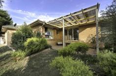  4 Cottam Pl Nicholls ACT 2913 $540,000+ An opportunity to secure a Great Family Home! Looking for great value in a family home in Nicholls. This has surely got to be it. In mainly original but in pretty good condition this great property is in an extremely convenient location and offers plenty of space for a growing family. 4 Cottam place is a brilliant 4 bedroom en suite family home. The home boasts 4 big bedrooms 3 with built in robes and the master bedroom comes with an en suite and a walk in robe, two living areas, formal dining area, ducted gas heating, large double garage under the roof line, all on a great sized 663 m2 block of land. Our realistic owners have decided to let this property go after many years. Currently let to great tenants, the option to continue to rent the property or move in and make it your new home is yours. EER 3.5 Please speak with Tim Russell image: chrome-extension://lifbcibllhkdhoafpjfnlhfpfgnpldfl/call_skype_logo.png0416 087 834 or Jeremy Julian image: chrome-extension://lifbcibllhkdhoafpjfnlhfpfgnpldfl/call_skype_logo.png0423 141 529 for further information or a private inspection. Features include: 4 bedrooms with built in robes Gas cooking Double garage under the roof line Two good sized living areas 663m2 of land Cul-de-sac location Rear pergola   Property Snapshot  Property Type: House Land Area: 663 m2 Features: EER: 3.5 