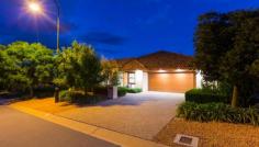  18 Evadell St Gungahlin ACT 2912 Location, luxury & livability Auction to be held on Saturday 30th April 2016 at 10:00am onsite Have you been thinking about building because you just can’t find the quality that you’ve been looking for? You must do yourself a favor and visit this outstanding family home that not only ticks all the boxes for ultimate easy family living but is in better than new condition. With loads of livability features (listed below) along with design features such as 9 ft ceilings, stunning kitchen, segregated living spaces, stunning alfresco and outdoor living spaces you can really call this property Home. The current owners have put a great amount of thought into the lighting throughout the home, the soft furnishings, flooring choices and lots of little touches that really give the home a gorgeous character. Once you’ve settled in and are ready to leave home you find Yerrabi Pond just a stroll away, have coffee or a meal at the local cafes and restaurants. The Gungahlin region is spoilt for great schools, shopping and lifestyle facilities. The owners have made the difficult decision to down size, so please do not delay your inspection or please call Kaylene or Andrew to discuss this absolute gem. Livability Features;  - 	 North facing living areas - 	 In slab zoned Hydronic heating - 	 LED lighting throughout - 	 Ceiling fans in bedrooms and main living areas - 	 Solar panels; 3.1 KW - 	 Solar hot water - 	 Underground rain water tank, pumped to toilets - 	 Low water gardens Other Property Features; - 	 From the covered portico step into a wide entry hall with high ceilings - 	 The home has 2.7meter ceilings throughout - 	 The formal living & dining show off the Red Gum floors plus floor to ceiling windows, gas fireplace and access to the outdoor tiled terrace - 	 The kitchen features 40cm stone bench tops, ILVE 120cm gas cook top & a 120lt oven.  - 	 You will love the walk-in pantry, the soft close feature on all the cabinetry & the integrated dishwasher  - 	 By the way… the pantry is insulated, just in case you’d like to store some wine - 	 The casual dining & family area is incredibly generous, open plan & very inviting adjacent to the kitchen - 	 Both the formal & informal spaces flow out to large covered Alfresco, great for the largest of family gatherings - 	 Ducted reverse cycle air conditioning throughout - 	 Four channel stereo system to the formal lounge/dining, living, library and alfresco areas, with individual controls for each area - 	 ‘Crimsafe’ screens to the majority of the homes doors & windows - 	 All of the bedrooms are oversized & whilst bedroom 5 is currently fitted out & serves beautifully as a library it is easily restored to a full bedroom - 	 The parent retreat is very special with a custom fitted dressing room, large ensuite with double vanity & the room opens on to the back terrace to soak up some morning sun - 	 Both bathrooms are finished beautifully with floor to ceiling tiles & quality fixtures & the main bathroom features a freestanding bathtub - 	 There is ample storage throughout the home: bedrooms, laundry, hall linen press and garage - 	 Ducted vacuum - 	 Custom joinery to the family room - 	 The professionally landscaped, easy care gardens have been well thought out, are now very well established & give privacy both front & back.  - 	 The oversized double garage gives internal access  - 	 Automatic, dripper irrigation to the gardens - 	 287sqm of living  - 	 Rates; 	 $2,142.00 per annum - 	 Land Tax; 	 $$3,281.00 per annum if rented   Property Snapshot  Property Type: House House Size: 287.00 m2 Features: Liveability EER: 5.0 