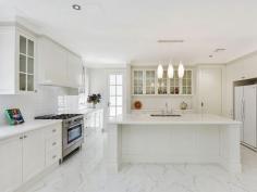  20 Bannockburn Rd Pymble NSW 2073 $3,945,000 SUPERB NEW HOME, DOUBLE BRICK, PERFECT LOCATION! Optimally positioned east side of Pymble this instantly attractive residence in an aesthetically beautiful tree lined street is approximately 800 meters to railway station with convenient access to shopping, private schools, parks, universities and main arterial roads. Quality construction with modern family living in mind, the current owners have emanated a home of timeless Classic appeal through their love of architecture style, beauty and care for the area. Imposing facade boasting a welcoming tiled foyer infusing luxury, with generously proportioned living spaces both formal and casual, bespoke bathrooms, well-appointed kitchen plus more on offer in desirable location close to all you need to enjoy for many years to come. Highlights:  * Fully secure and private on near level 930sqm land in family-friendly neighbourhood * 2.7m high ceilings, refined foyer, visually appealing staircase, European signature finishes  * Seamless flow throughout light-filled interiors, almost floor to ceiling windows in living rooms  * Open plan dining family/dining area with gas fireplace leading to level backyard * Sumptuous French inspired CaesarStone benchtop gas kitchen, Blanco oven  * Huge bedrooms with built-ins, each with a private outlook, Villeroy & Boch hand basins  * Main bedroom with walk-in-robe, full luxe ensuite, separate WC, elegant light fittings * Media/second family living, powder room adjoining large laundry with CaesarStone top benches * Sundrenched backyard (room for small splash pool STCA), covered terrace for year round entertaining  * Internal access from double lock-up garage, ample storage for the sports active enthusiasts * 4 zones Rinnai rev cycle air-conditioning, 100% wool plush carpet and tiled flooring * 2x 4500L underground water tanks, safe children playground front and rear of home  * Area internally approx 460 sqm Pymble Ladies' College, Pymble Public School & Gordon East Primary School catchment. Saturday Viewings 12.15pm - 1.00pm or By Appointment on request. Proudly presented by  Lavenia Liu 0413 555 017 Carlos Leite 0417 226 496 DISCLAIMER: All information contained herein is gathered from sources that we believe reliable. We have no reason to doubt its accuracy, however we cannot guarantee it. This information is not to be used in formalising any decision nor used by nor used by a third party without the expressed written permission of LJ Hooker Gordon.   Property Snapshot  Property Type: House Construction: Double Brick Land Area: 930 m2 Features: Built-In-Robes Ensuite Family Room Fenced Back Yard Storage 