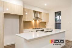  51a Minns St Seaton SA 5023 Brand New Large Living Quality Features Why build and wait when you can buy one of these magnificent family size homes sitting on approx 352sqm Torrens Titled allotments. Brand new and ready to move in, you will love these homes as much as we do. Featuring: - 	 3 bedrooms, master with walk-in-robe and ensuite - 	 Bedrooms 2 & 3 with built-in-robes - 	 Multiple living areas; including separate lounge plus open plan dining and living rooms - 	 Quality fittings throughout - 	 Spacious kitchen with stone bench tops, quality cabinetry, glass splashback, stainless steel appliances and a dishwasher - 	 Ducted reverse cycle air-conditioning - 	 LED down lights - 	 2.7m ceilings - 	 2.4m doors and windows - 	 Intercom and alarm system - 	 Alfresco entertaining area - 	 New fencing, aggregate concrete driveway and yard landscaping Seaton is a booming suburb located perfectly between the City and the Sea and becoming the suburb of choice for families and working professionals. Contact Justin Peters of LJ Hooker on image: chrome-extension://lifbcibllhkdhoafpjfnlhfpfgnpldfl/call_skype_logo.png0423 341 797 for more information and inspection times. Note: Images and floorplan are of 51a Minns St Seaton. RLA: 242 629   Property Snapshot  Property Type: House 